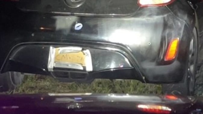 an-australian-woman-crafted-cardboard-number-plates-after-hers-were-confiscated-by-police-Jameson-Law
